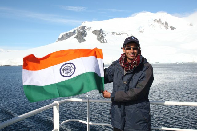 Holding the Indian flag on the deck of the M/V Ushuaia, Antarctica